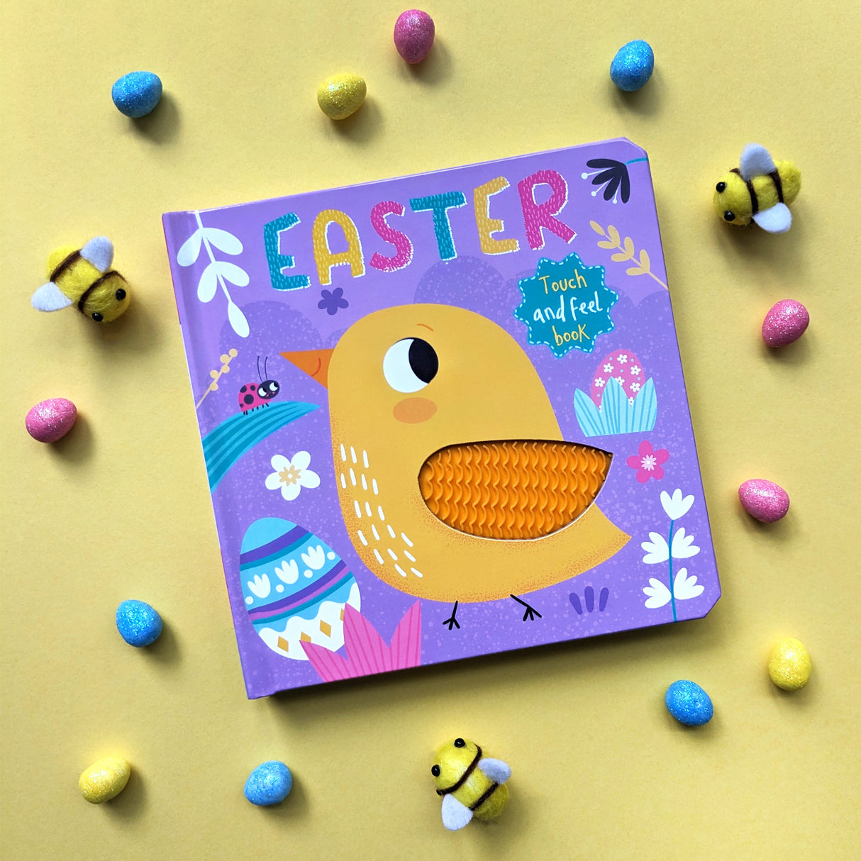 Children's Easter book with a colorful cover featuring a duck and Easter elements on a yellow background.